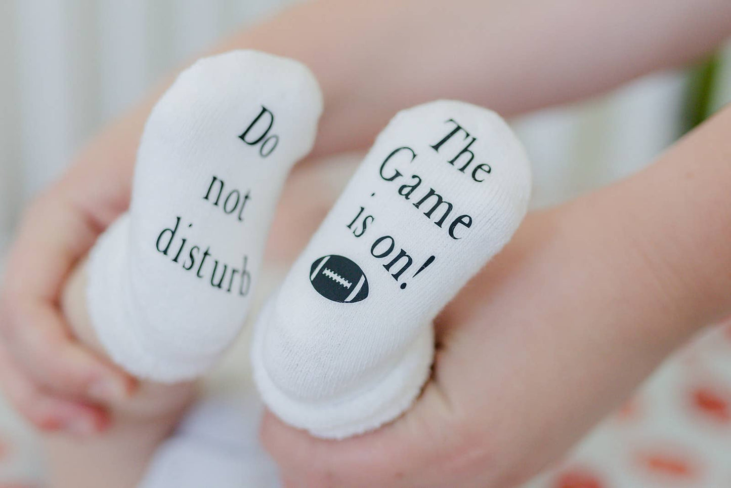 Do Not Disturb The Game is on Football Baby Socks